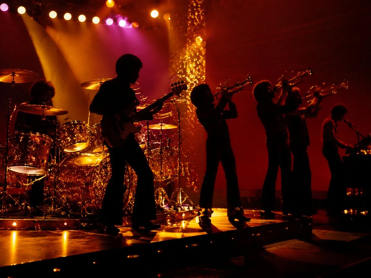 Bruno on lead vocals with .Paak on keys, full horn section